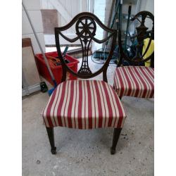Vintage wooden chair with striped cover