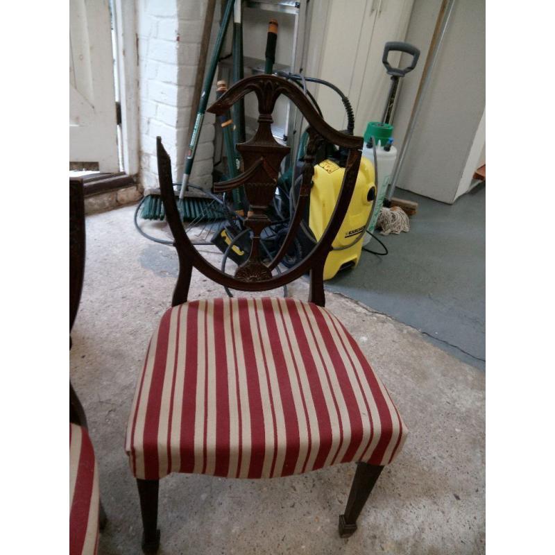 Vintage wooden chair with striped cover
