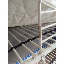 White metal framed bunk beds no mattresses