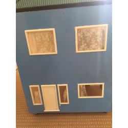 Large wooden dolls house