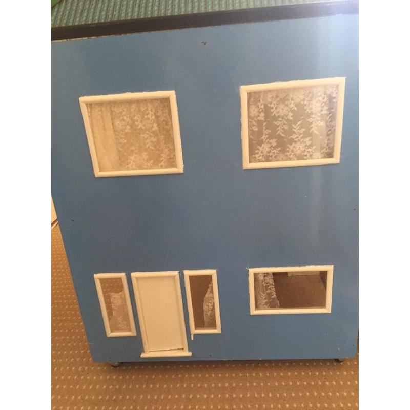 Large wooden dolls house
