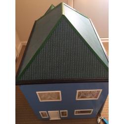 Large wooden dolls house