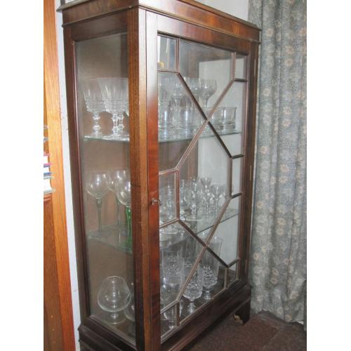 Dark wood and glass display cabinet