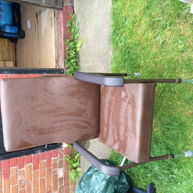 Height adjustable disability chair