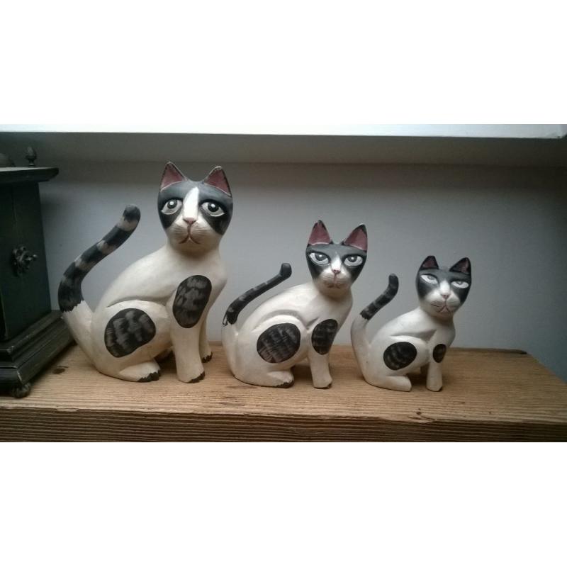 set of three wooden cats