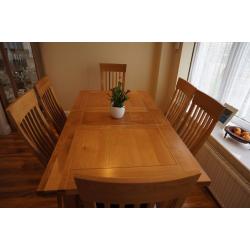 Oak Extendable Dining Table - with 6 leather cushioned chairs