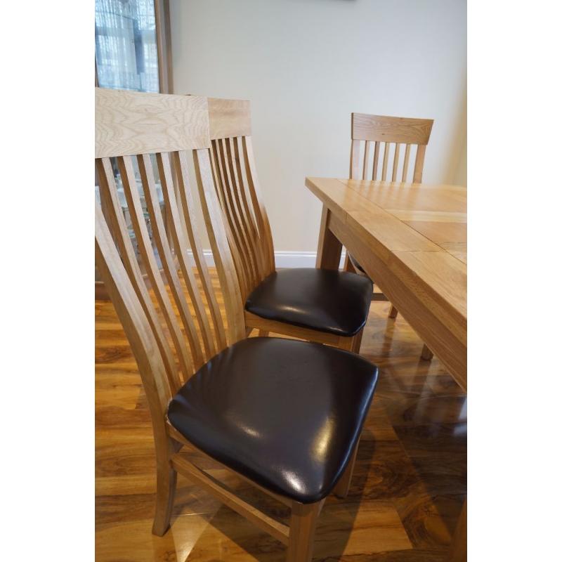 Oak Extendable Dining Table - with 6 leather cushioned chairs