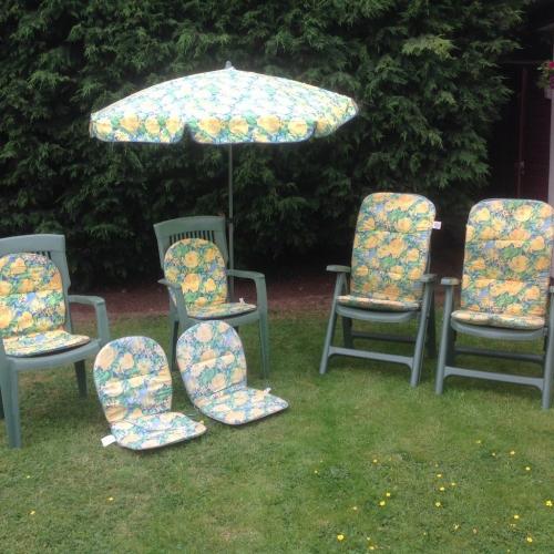 2 reclining garden chairs, 2 garden chairs both with matching seat pads and umbrella
