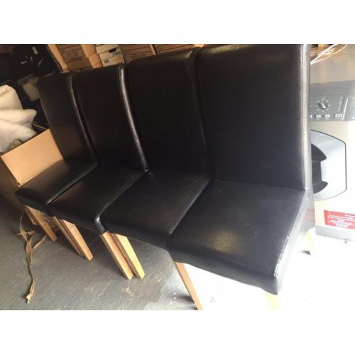 4 black faux leather dining chairs