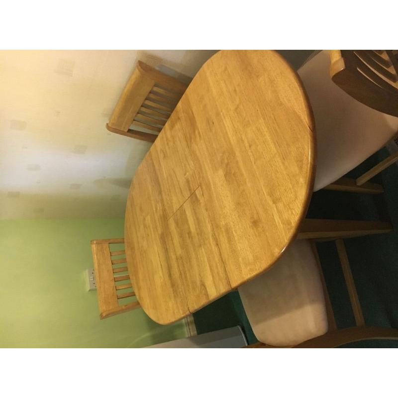 Extending table with 4 chairs