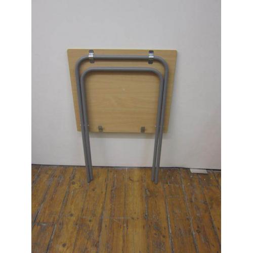 Small folding table for sale .