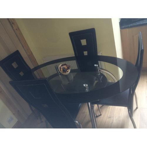 Dining table and 4 chairs for sale