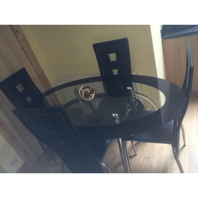 Dining table and 4 chairs for sale