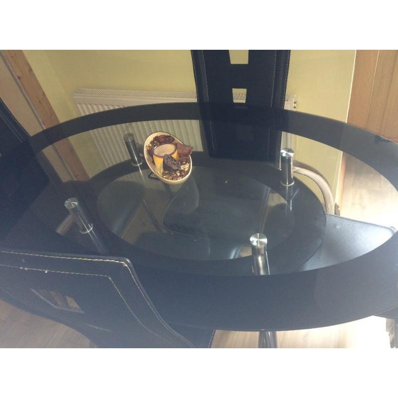Dining table and 4 chairs for sale