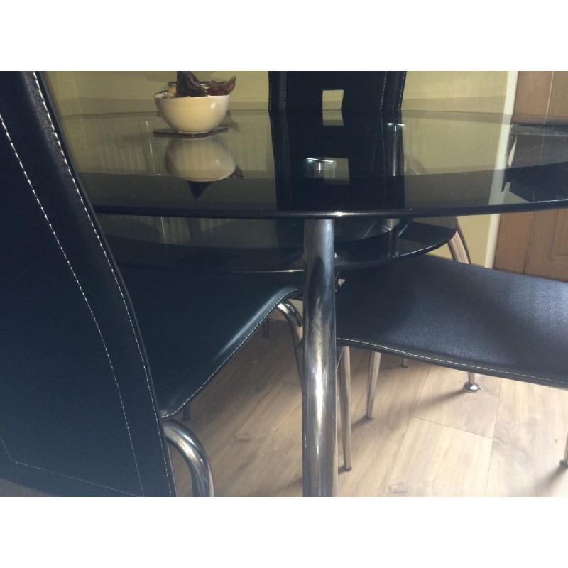 Dining table and 4 chairs for sale