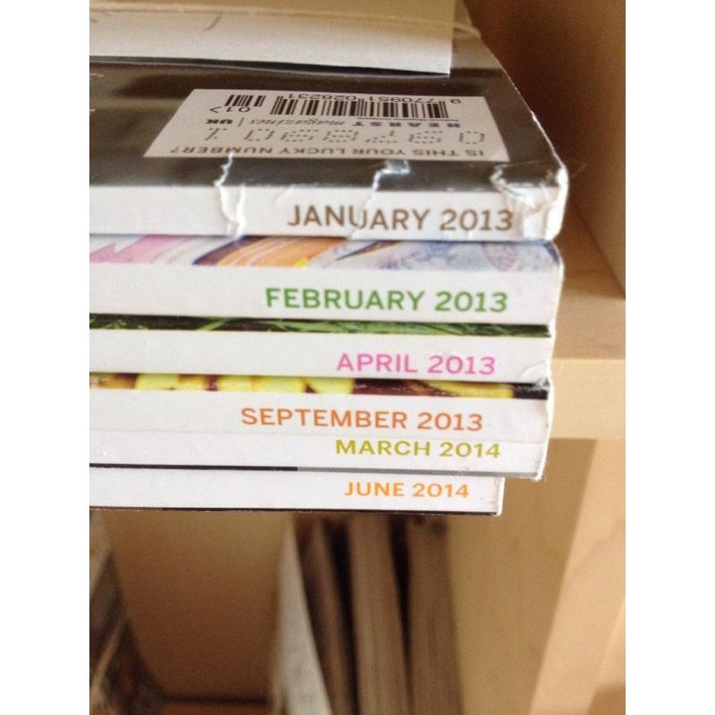 Back issues of Country Living magazines for sale.