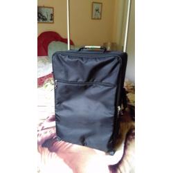 1 meduim light weight 1 small compack suitcases 1 bag as holdall or trolley or as backpack