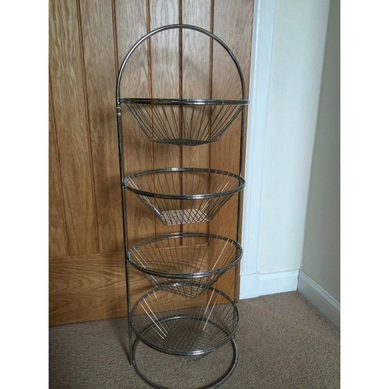 Metal vegetable baskets and stand