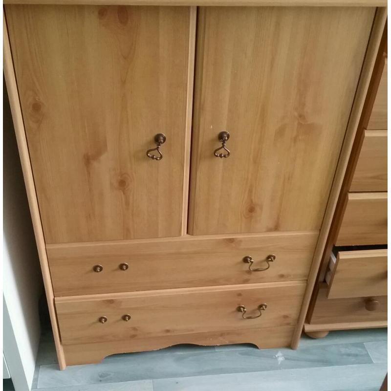 Pine cabinet with two drawers and opening doors
