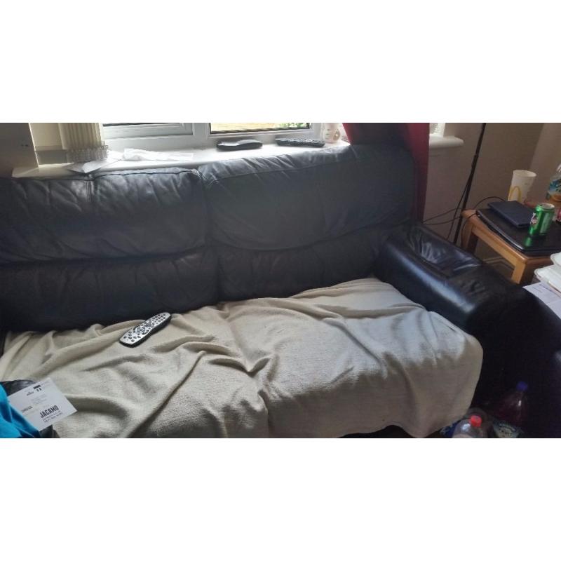 Couches free to collect from bellshill.. 1 brown 2 seater and 2 black .
