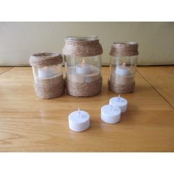 Glass jar tea lights decorated with garden twine, sand and electric candles-ideal for weddings