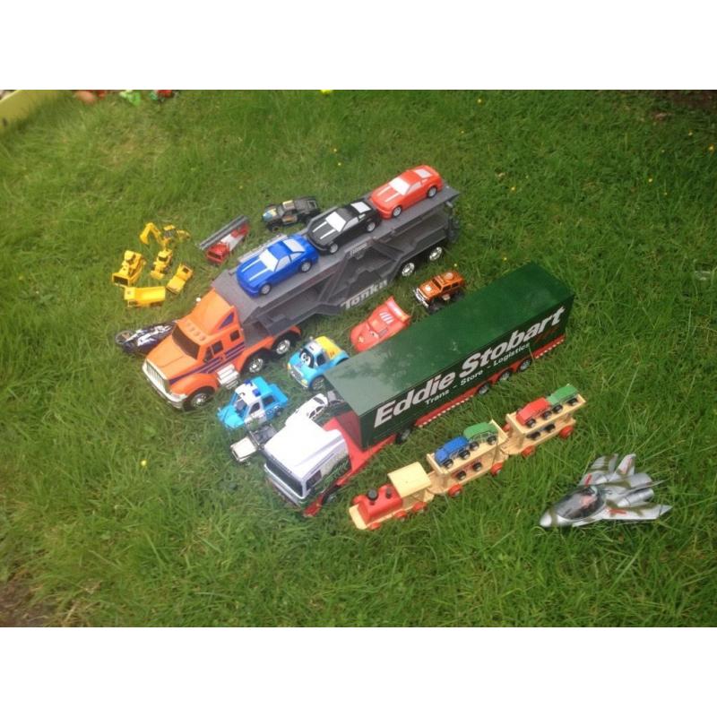 Large trucks and a selection of cars
