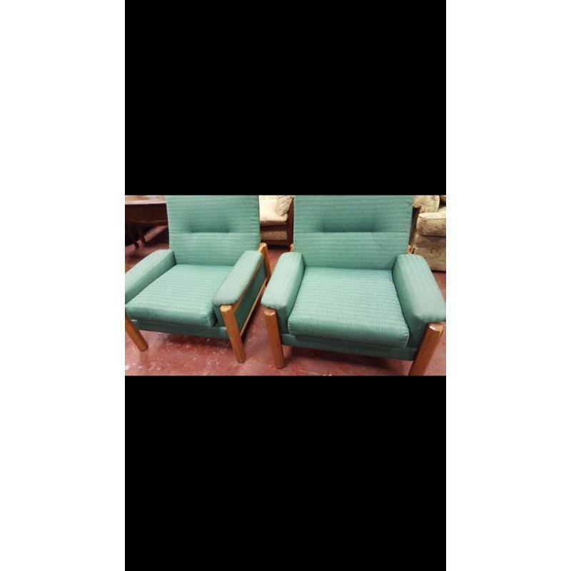 Green arm chairs