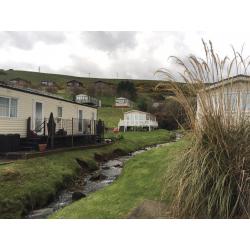 New static caravan for sale near Edinburgh & Berwick. Great location next to superb sandy beach.