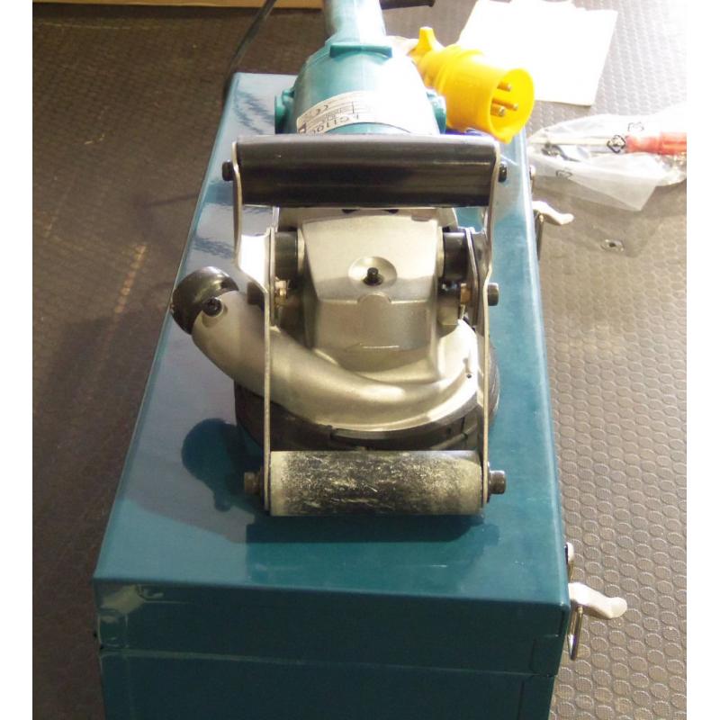 MAKITA PC1100 CONCRETE PLANER (USED ONCE)