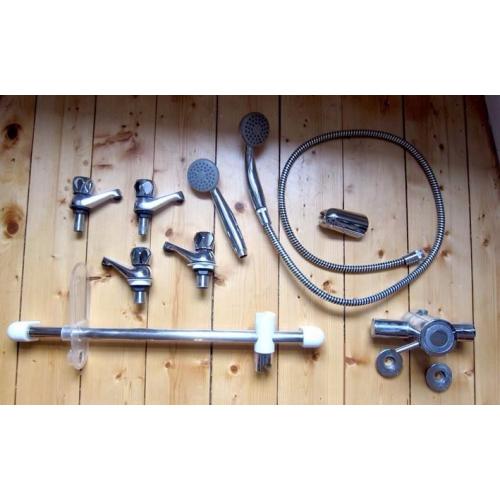 Four basic taps, a shower mixer, shower riser, two shower heads + one hose: FREE