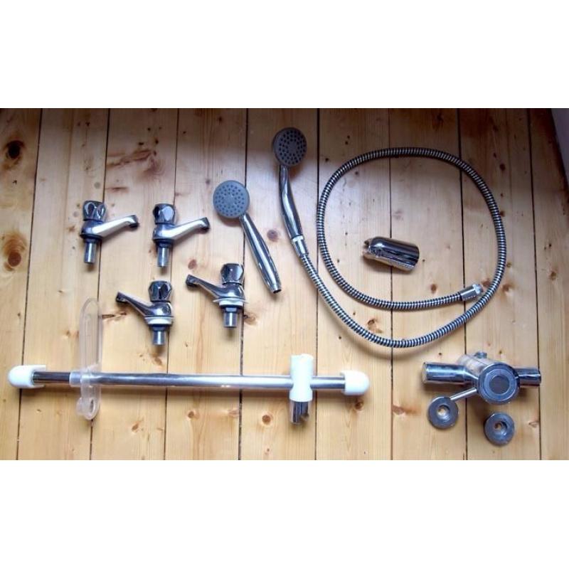 Four basic taps, a shower mixer, shower riser, two shower heads + one hose: FREE
