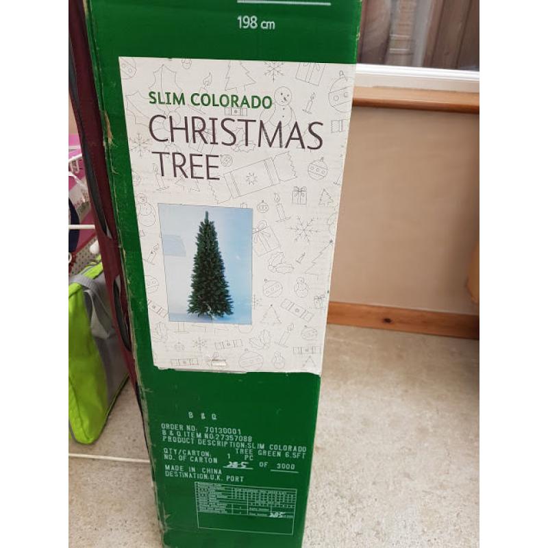 Slimline Artificial Christmas Tree, artificial wreath, various lights and decorations