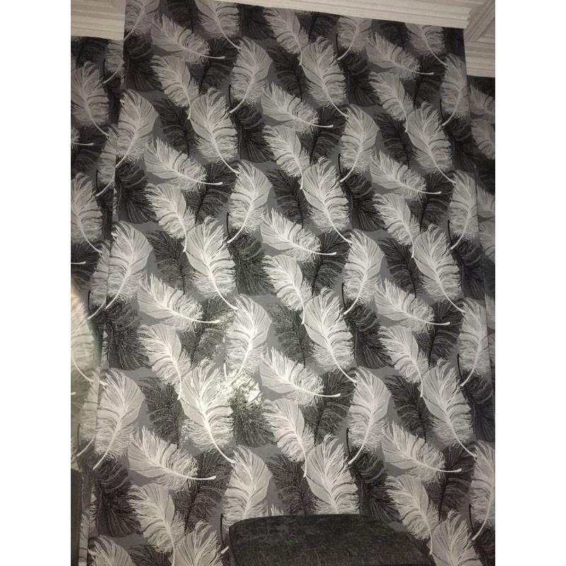 Grey, black and white feather wallpaper