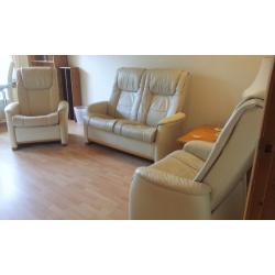 Scandinavian leather suite with reclining seats and 2 storage footstools