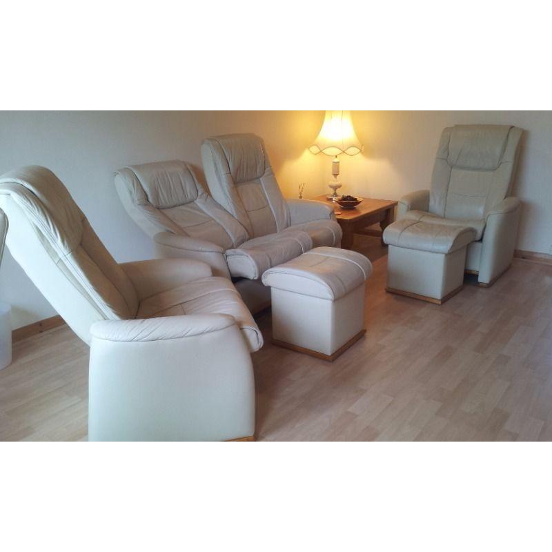 Scandinavian leather suite with reclining seats and 2 storage footstools