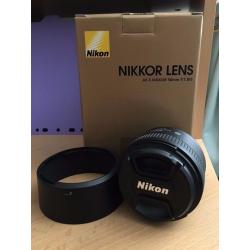 Nikon Nikkor 50mm f/1.8 with lens hood