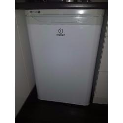 Indesit under counter fridge. Less than 1 year old.