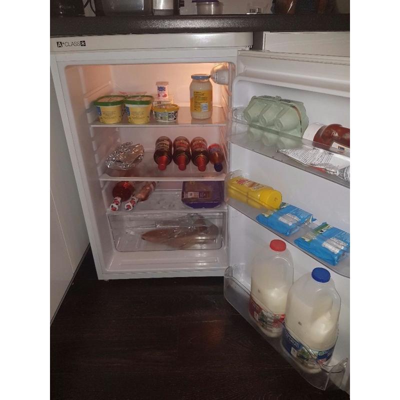 Indesit under counter fridge. Less than 1 year old.