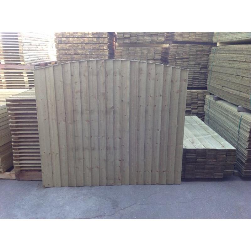 Heavy duty arched top Tanalised timber fence panels vertical board, feather edge