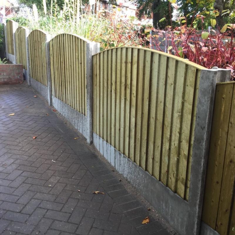 Heavy duty arched top Tanalised timber fence panels vertical board, feather edge