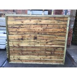 Heavy duty arched top Tanalised timber fence panels vertical board, feather edge