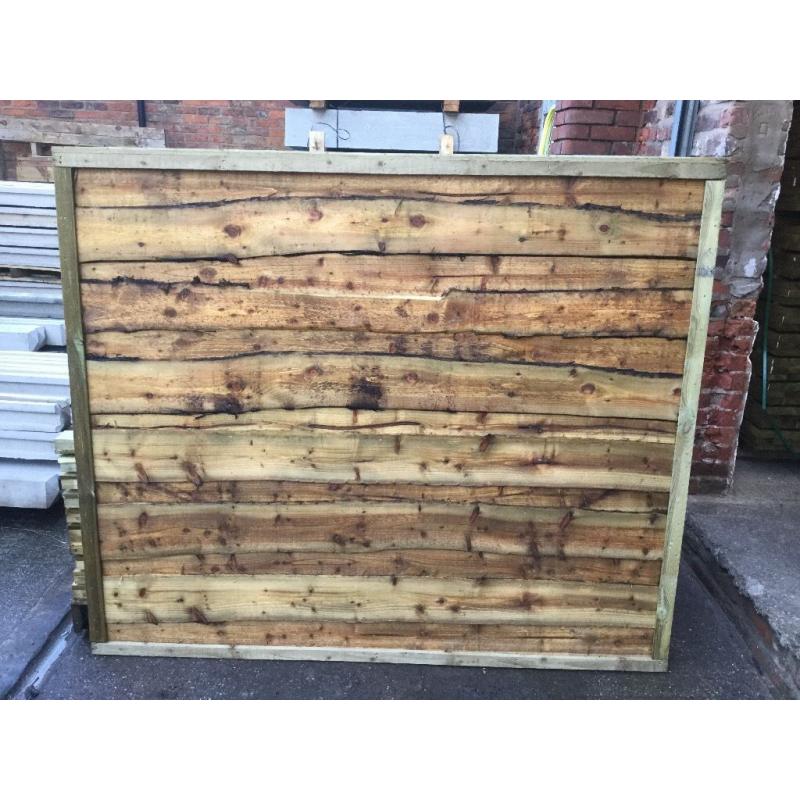 Heavy duty arched top Tanalised timber fence panels vertical board, feather edge