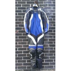 FRANK THOMAS ONE PIECE MOTORBIKE LEATHERS, BLACK WITH BLUE TRIM, SIZE UK 42