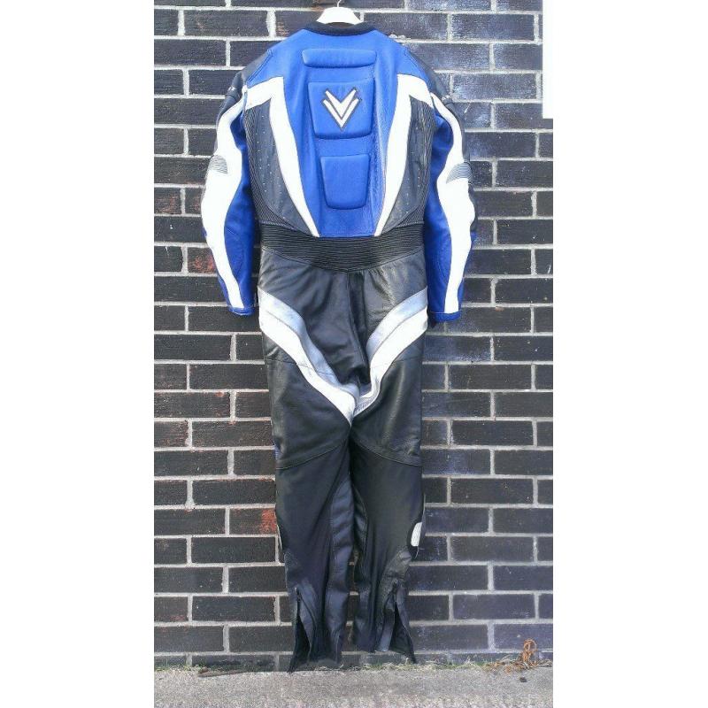 FRANK THOMAS ONE PIECE MOTORBIKE LEATHERS, BLACK WITH BLUE TRIM, SIZE UK 42