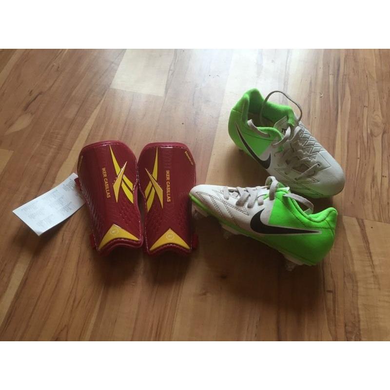 Junior Nike football boots size 10 and junior Reebok shin pads
