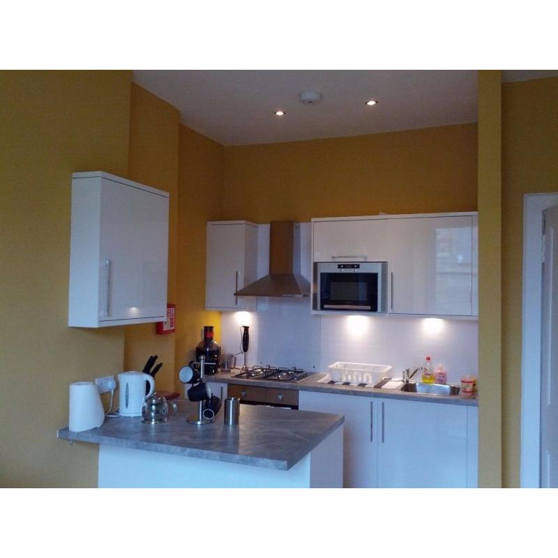Spacious double bedroom in freshly renovated flat during festive period