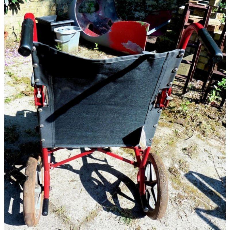 Wheelchair - folds, but not lightweight design. Needs attention, but serviceable.