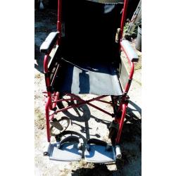 Wheelchair - folds, but not lightweight design. Needs attention, but serviceable.