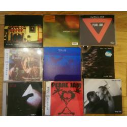 Collection of Pearl Jam singles on CD, some promo