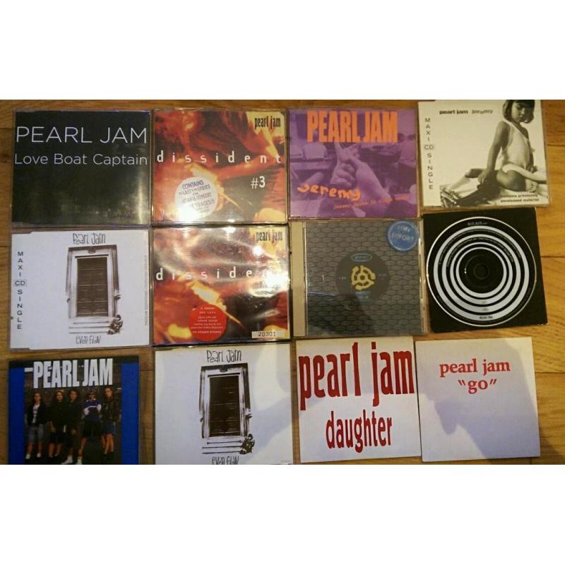 Collection of Pearl Jam singles on CD, some promo